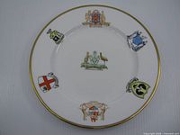 Full view of plate showing gold rim and state crests
