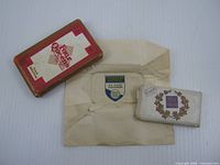 Group showing Four Queens boxed soap, Canadian Pacific wrapper, Palmolive Hotel Vancouver soap