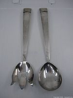 Full view of spoon and fork side by side