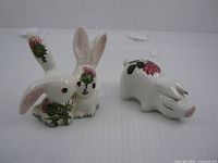 Group view of rabbit and pig figurines