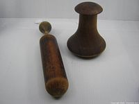 Both wooden pestles overview
