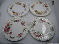 Group image of all four floral plates