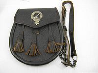 Front view of leather sporran with Clan MacMillan badge and tassels