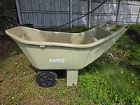 Left side profile of Ames lawn cart showing wheels and body