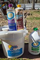 HTH clarifier, HTH filter flush, In The Swim alkalinity increase pail, HTH algae guard jug