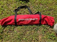 Red PowerNet branded carry bag closed