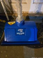 Blue Snow Joe iON13SS snow shovel head with model label visible