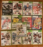 All 13 Xbox 360 game cases laid out