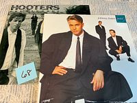 Both album covers side by side with lot number note visible