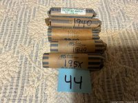 All five labeled rolls stacked