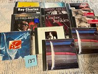 All 12 CDs laid out to show front covers