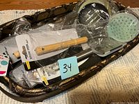 overview of basket loaded with new packaged utensils