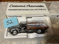 Model truck in Styrofoam insert with box visible