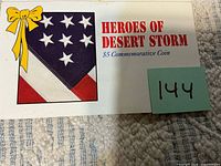 presentation card front showing Heroes of Desert Storm title