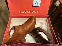 Boots in box showing both shoes