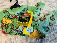 Full view of pajama set with tag