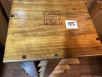 top view showing branded stamp and dowel joinery