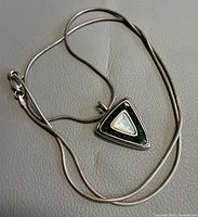 Full view of necklace and pendant front