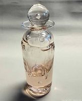 Full view of perfume bottle with stopper