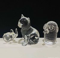 front view of all three glass figures