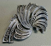 Front view showing curved design and marcasite stones