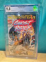 Front view of CGC-graded Ghost Rider #31 showing 9.8 grade and cover art