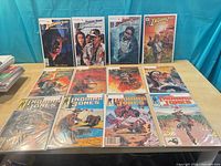 Overall group shot showing all 12 bagged comics laid out