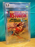 Front view of CGC-slabbed Tales to Astonish #57