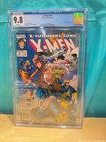 Front view of CGC-slabbed X-Men #16 showing cover art and grade 9.8 label