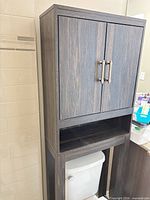 Full front view of the cabinet showing doors, hardware and lower shelf