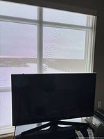 Front view of Samsung 40" TV on stand