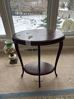 Full view of accent table in front of window