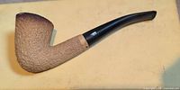 Left side view of rusticated meerschaum pipe
