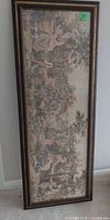 Full view of framed tapestry