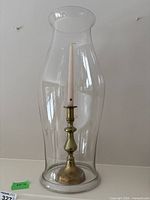 Full view of hurricane with candlestick and candle