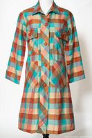 Full front view of multicolor plaid dress on mannequin