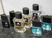 Full lot of seven Adidas EDT bottles