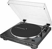 Turntable front angle with lid open showing platter, tonearm, controls