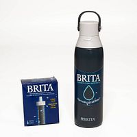 Brita stainless steel water bottle beside box of 6 filters