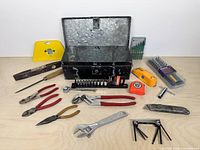 all items displayed around open toolbox