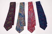 Front view of four silk paisley ties