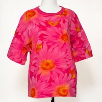 Front view of hot pink daisy print Benetton t-shirt on mannequin
