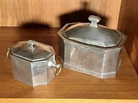 Both pewter boxes side by side