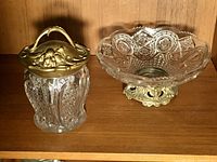 humidor and serving bowl side by side on shelf
