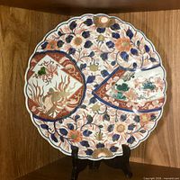 Full view of Imari charger plate on stand