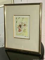 Framed watercolour artwork front view on stand