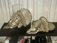 Both seashell wall shelves on display stand