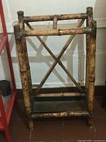 Full view of bamboo umbrella stand front angle