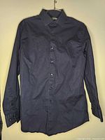 Front view of dark navy DKNY dress shirt