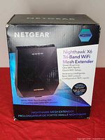 Front of retail box showing product name and AC2200 rating